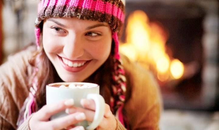 Woman Drinking Hot Chocolate --- Image by © Tim Pannell/Corbis