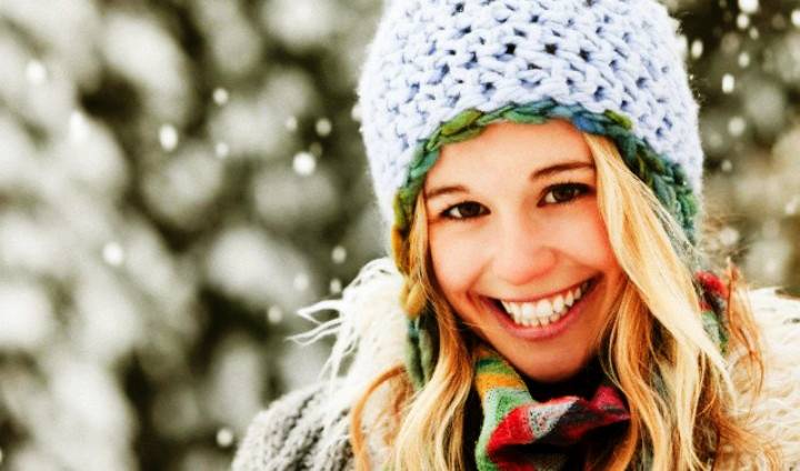 USA, Utah, Salt Lake City, portrait of young woman in winter clothing --- Image by © Mike Kemp/Tetra Images/Corbis