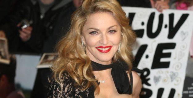 Madonna Rocks Red Gloves At The W.E. Premiere