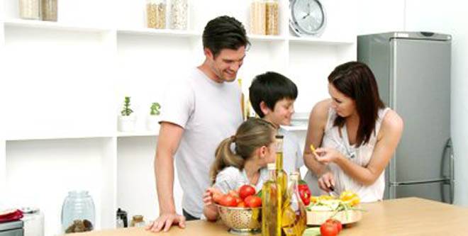 stock-footage-family-at-home-in-kitchen-preparing-lunch-and-having-a-good-time