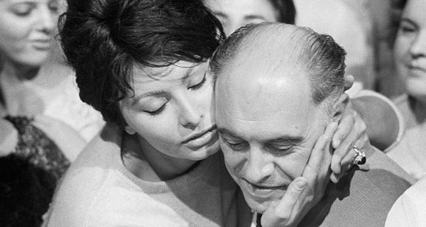 Sophia Loren kissing husband Carlo Ponti, 1950s. Photo by Pierluigi Praturlon