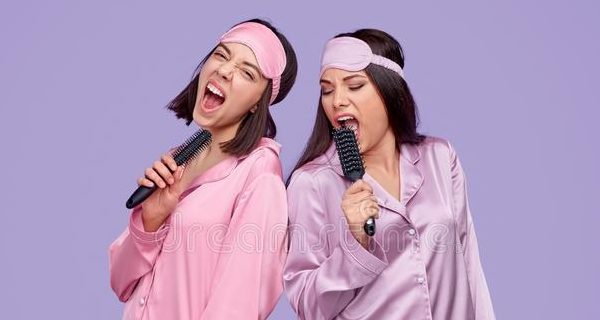friends-pajamas-singing-combs-excited-women-silk-sleepwear-hairbrushes-having-fun-pajama-party-against-violet-164759609-e1592943146893.jpg