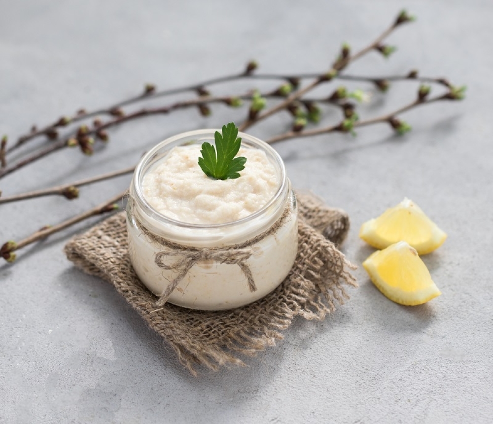 stock-photo-russian-appetizer-white-horseradish-with-lemon-in-a-jar-on-a-linen-napkin-in-rustic-style-1694260312_1000x0