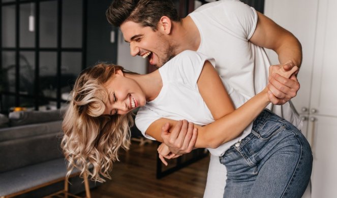 491835_wonderful-girl-white-t-shirt-dancing-with-boyfriend-indoor-portrait-winsome-lady-fooling-around-home-with-husband_f.jpg