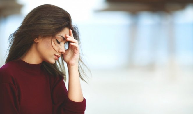 244895_xxstock-photo-stressed-woman-with-headache-on-the-beach-outdoor-sad-woman-540462781_f