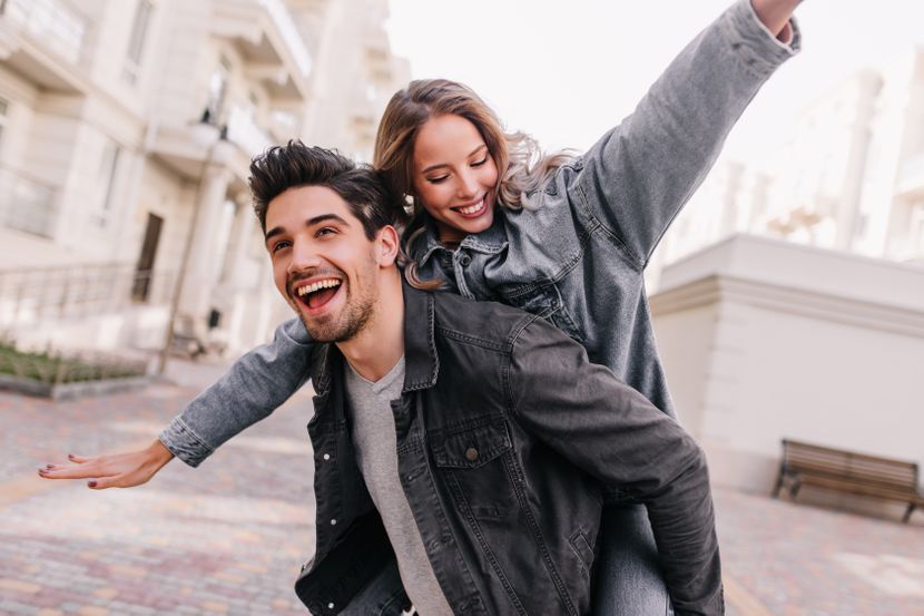 excited-man-black-denim-jacket-chilling-with-girlfriend-outdoor-portrait-happy-couple-exploring-city-830x0