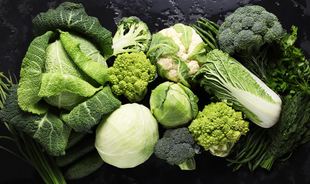 Different,Kinds,Of,Cabbage,Background,In,Black,Table.,Green,Vegetables.