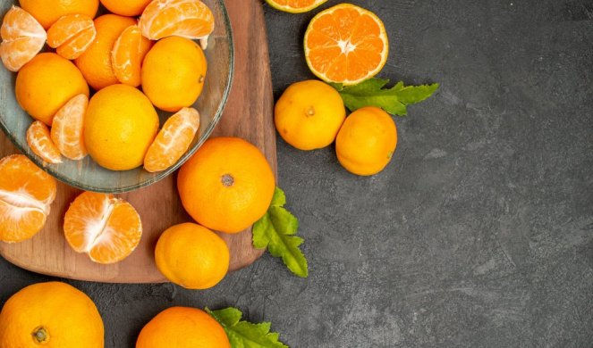 496079_top-view-tasty-juicy-tangerines-inside-plate-grey-background_f