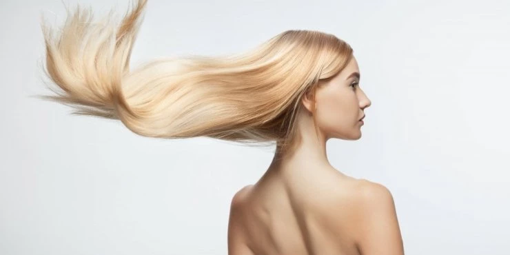 629266_beautiful-model-with-long-smooth-flying-blonde-hair-isolated-white-studio-background-young-caucasian-model-with-well-kept-skin-hair-blowing-air_m