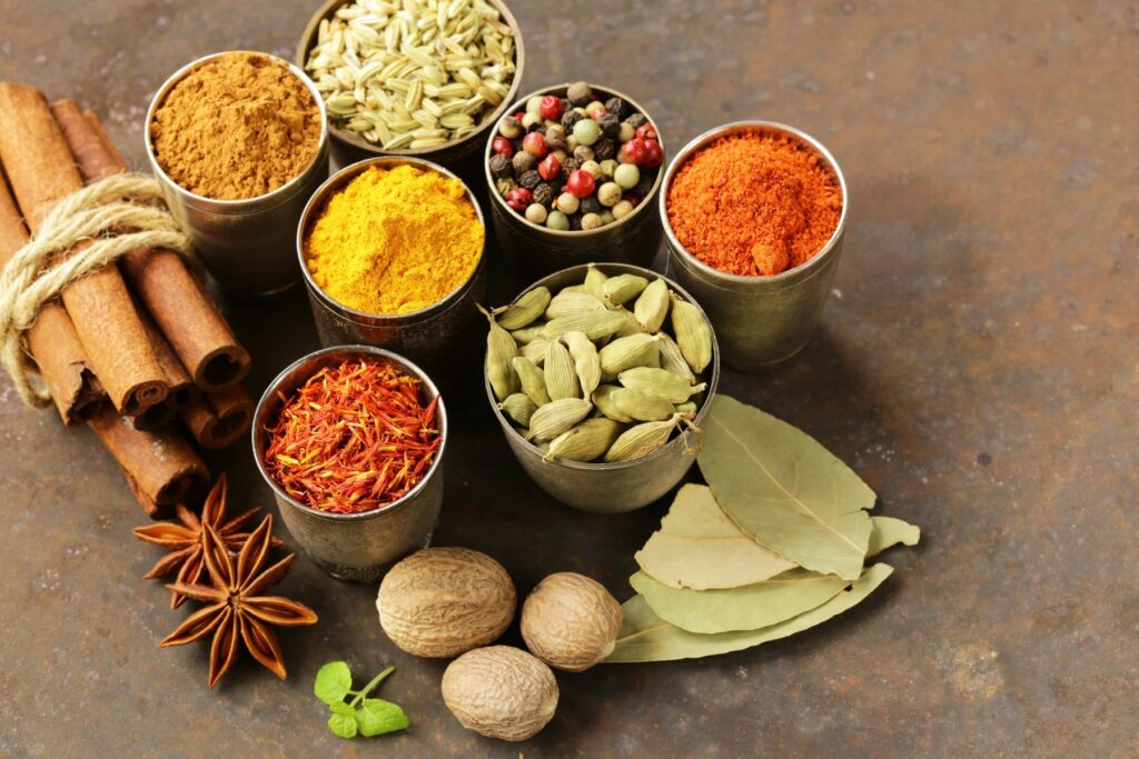 variety of spices (saffron, paprika, pepper, fennel, cinnamon, turmeric, nutmeg)