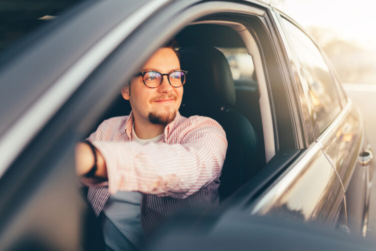 A,Young,Happy,Stylish,Smiling,Man,In,Glasses,Driving,A