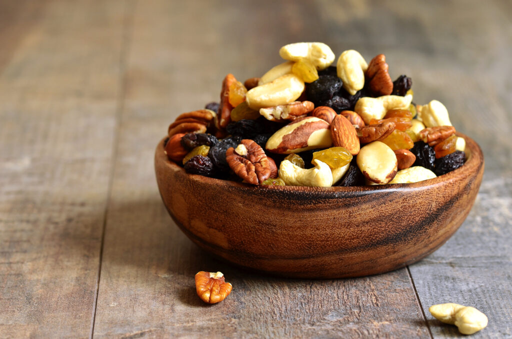 Dried,Fruits,And,Nuts,Mix,In,A,Wooden,Bowl.