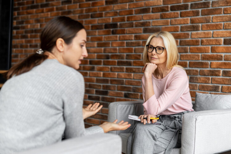 Worried,Young,Woman,Patient,Sitting,At,A,Psychologist's,Therapist,Appointment