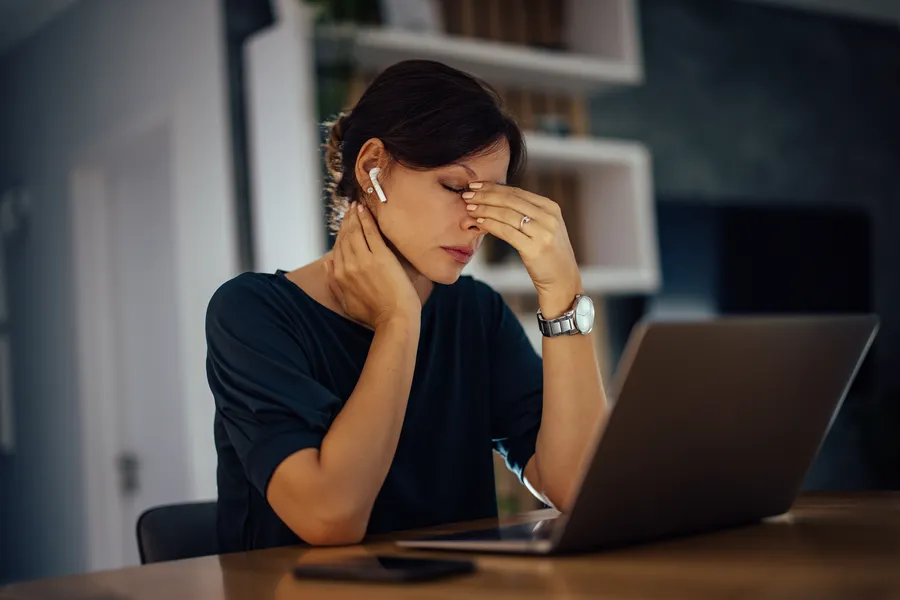 1728825148-exhausted-businesswoma.format-webp.width-900